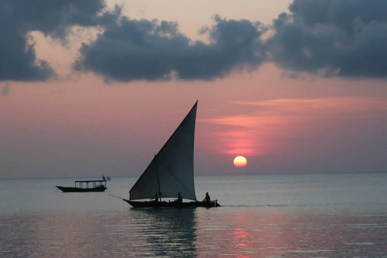 A dhow sailing off Zanzibar at sunset
