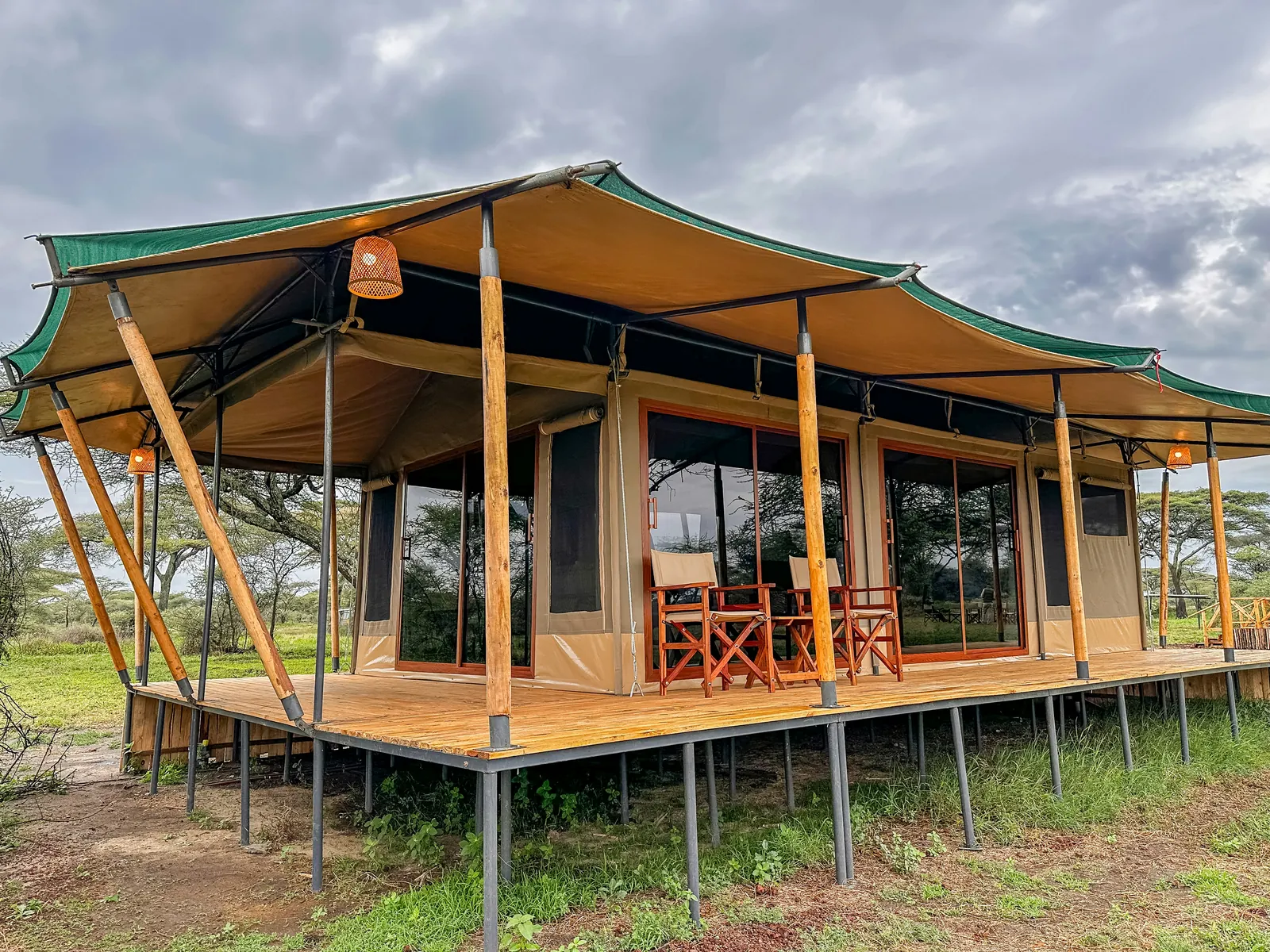 A tented safari room with a private deck
