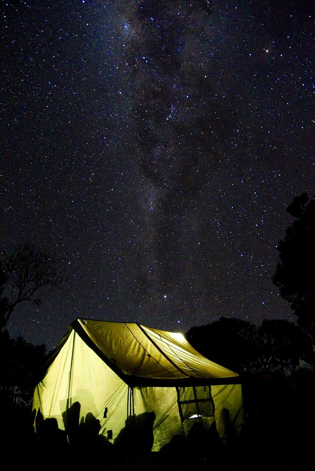 A tent under the Milky Way on the mountain